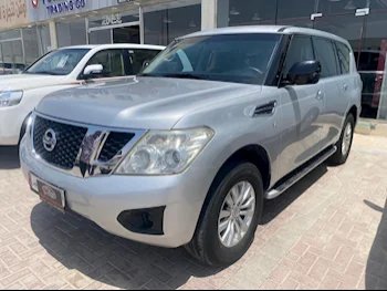 Nissan  Patrol  XE  2014  Automatic  144,000 Km  8 Cylinder  Four Wheel Drive (4WD)  SUV  Silver