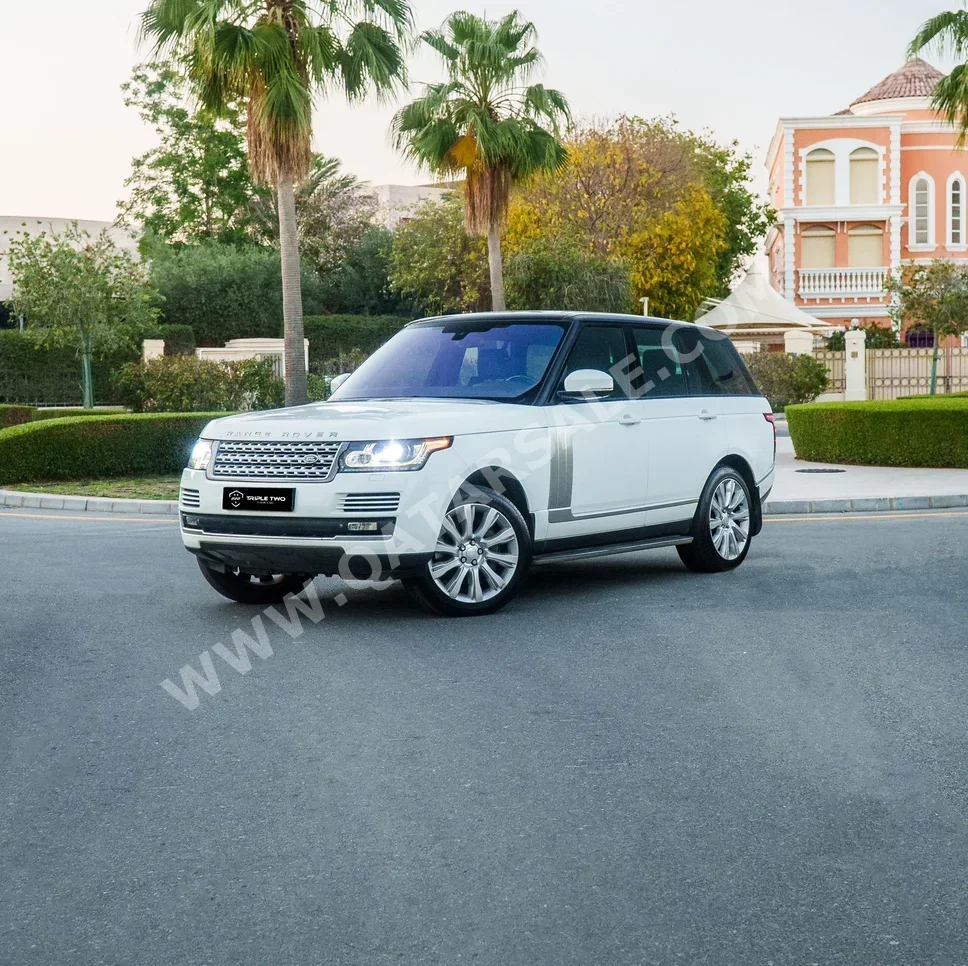 Land Rover  Range Rover  Vogue Super charged  2014  Automatic  181,000 Km  8 Cylinder  Four Wheel Drive (4WD)  SUV  White