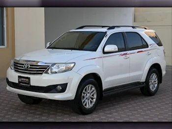 Toyota  Fortuner  2015  Automatic  129,000 Km  6 Cylinder  Four Wheel Drive (4WD)  SUV  White