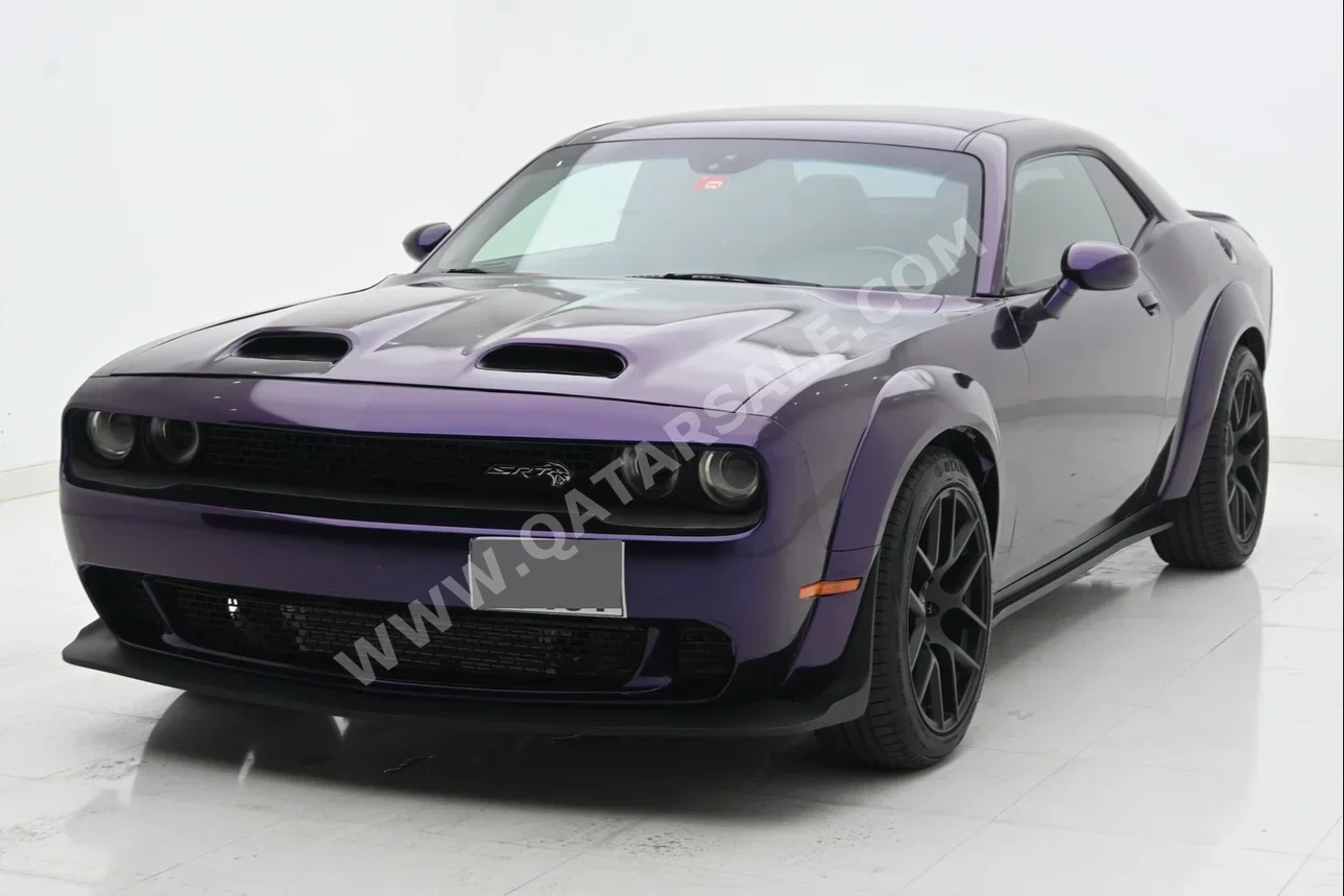 Dodge  Challenger  2015  Automatic  61,000 Km  6 Cylinder  Rear Wheel Drive (RWD)  Coupe / Sport  Violet