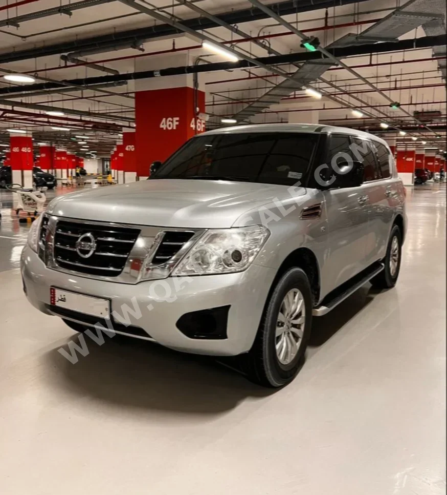 Nissan  Patrol  XE  2016  Automatic  120,000 Km  8 Cylinder  Four Wheel Drive (4WD)  SUV  Silver