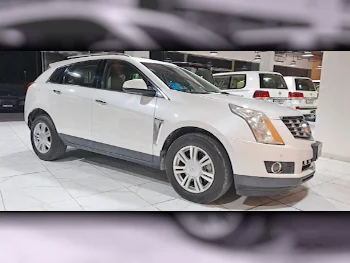 Cadillac  SRX  2015  Automatic  115,000 Km  6 Cylinder  Four Wheel Drive (4WD)  SUV  White