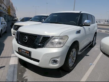 Nissan  Patrol  LE  2012  Automatic  169,000 Km  8 Cylinder  Four Wheel Drive (4WD)  SUV  White