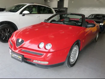 Alfa Romeo  SPIDER  1997  Automatic  200,000 Km  4 Cylinder  Rear Wheel Drive (RWD)  Coupe / Sport  Red