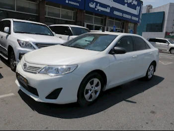 Toyota  Camry  2015  Automatic  245,000 Km  4 Cylinder  Front Wheel Drive (FWD)  Sedan  White
