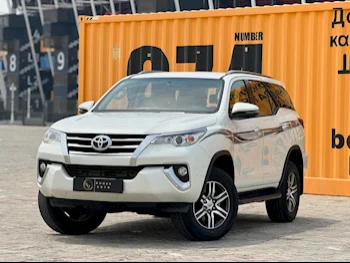 Toyota  Fortuner  2019  Automatic  115,000 Km  4 Cylinder  Four Wheel Drive (4WD)  SUV  White