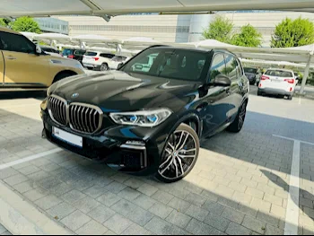BMW  X-Series  X5 M50i  2020  Tiptronic  75,000 Km  8 Cylinder  Four Wheel Drive (4WD)  SUV  Black  With Warranty