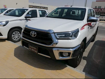 Toyota  Hilux  2023  Automatic  2,000 Km  4 Cylinder  Four Wheel Drive (4WD)  Pick Up  White  With Warranty