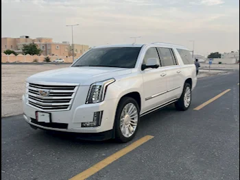  Cadillac  Escalade  Platinum  2017  Automatic  61,500 Km  8 Cylinder  Four Wheel Drive (4WD)  SUV  White  With Warranty