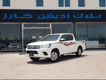 Toyota  Hilux  2020  Automatic  67,000 Km  4 Cylinder  Rear Wheel Drive (RWD)  Pick Up  White