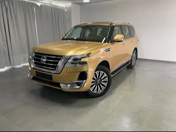 Nissan  Patrol  LE Titanium  2021  Automatic  0 Km  8 Cylinder  Four Wheel Drive (4WD)  SUV  Yellow  With Warranty
