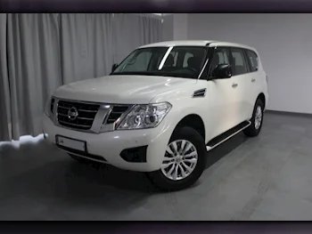 Nissan  Patrol  XE  2019  Automatic  76,544 Km  6 Cylinder  Four Wheel Drive (4WD)  SUV  White