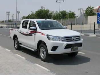 Toyota  Hilux  2023  Automatic  12,500 Km  4 Cylinder  Four Wheel Drive (4WD)  Pick Up  White  With Warranty