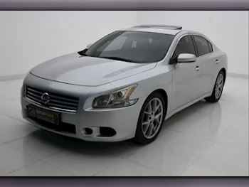 Nissan  Maxima  2011  Automatic  176,000 Km  6 Cylinder  Front Wheel Drive (FWD)  Sedan  Silver