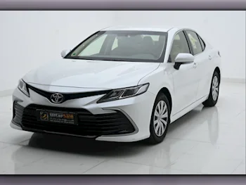 Toyota  Camry  LE  2022  Automatic  32,133 Km  4 Cylinder  Front Wheel Drive (FWD)  Sedan  White  With Warranty