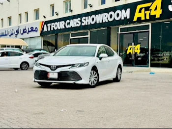 Toyota  Camry  Hybrid  2019  Automatic  91,000 Km  4 Cylinder  Front Wheel Drive (FWD)  Sedan  White