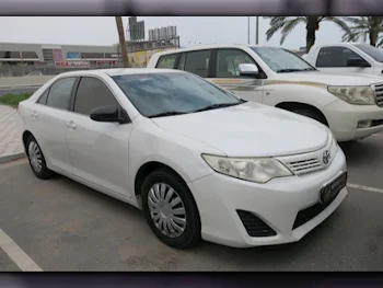 Toyota  Camry  2015  Automatic  210,000 Km  4 Cylinder  Front Wheel Drive (FWD)  Sedan  White