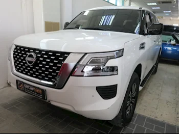 Nissan  Patrol  XE  2023  Automatic  35,000 Km  6 Cylinder  Four Wheel Drive (4WD)  SUV  White  With Warranty