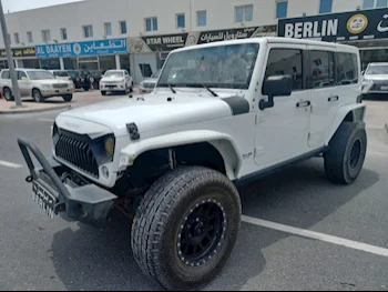  Jeep  Wrangler  Unlimited  2015  Automatic  200,000 Km  6 Cylinder  Four Wheel Drive (4WD)  SUV  White  With Warranty