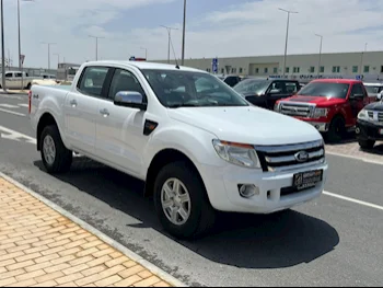 Ford  Ranger  2015  Manual  116,000 Km  4 Cylinder  Four Wheel Drive (4WD)  Pick Up  White