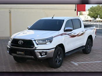 Toyota  Hilux  2022  Automatic  54,500 Km  4 Cylinder  Four Wheel Drive (4WD)  Pick Up  White