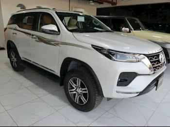 Toyota  Fortuner  2024  Automatic  0 Km  6 Cylinder  Four Wheel Drive (4WD)  SUV  White  With Warranty