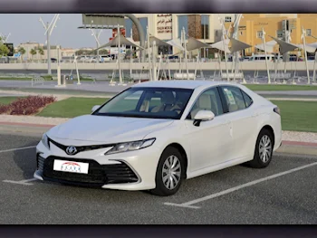 Toyota  Camry  LE  2022  Automatic  23,000 Km  4 Cylinder  Front Wheel Drive (FWD)  Sedan  White  With Warranty