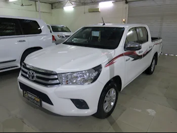 Toyota  Hilux  2023  Automatic  19,000 Km  4 Cylinder  Four Wheel Drive (4WD)  Pick Up  White  With Warranty
