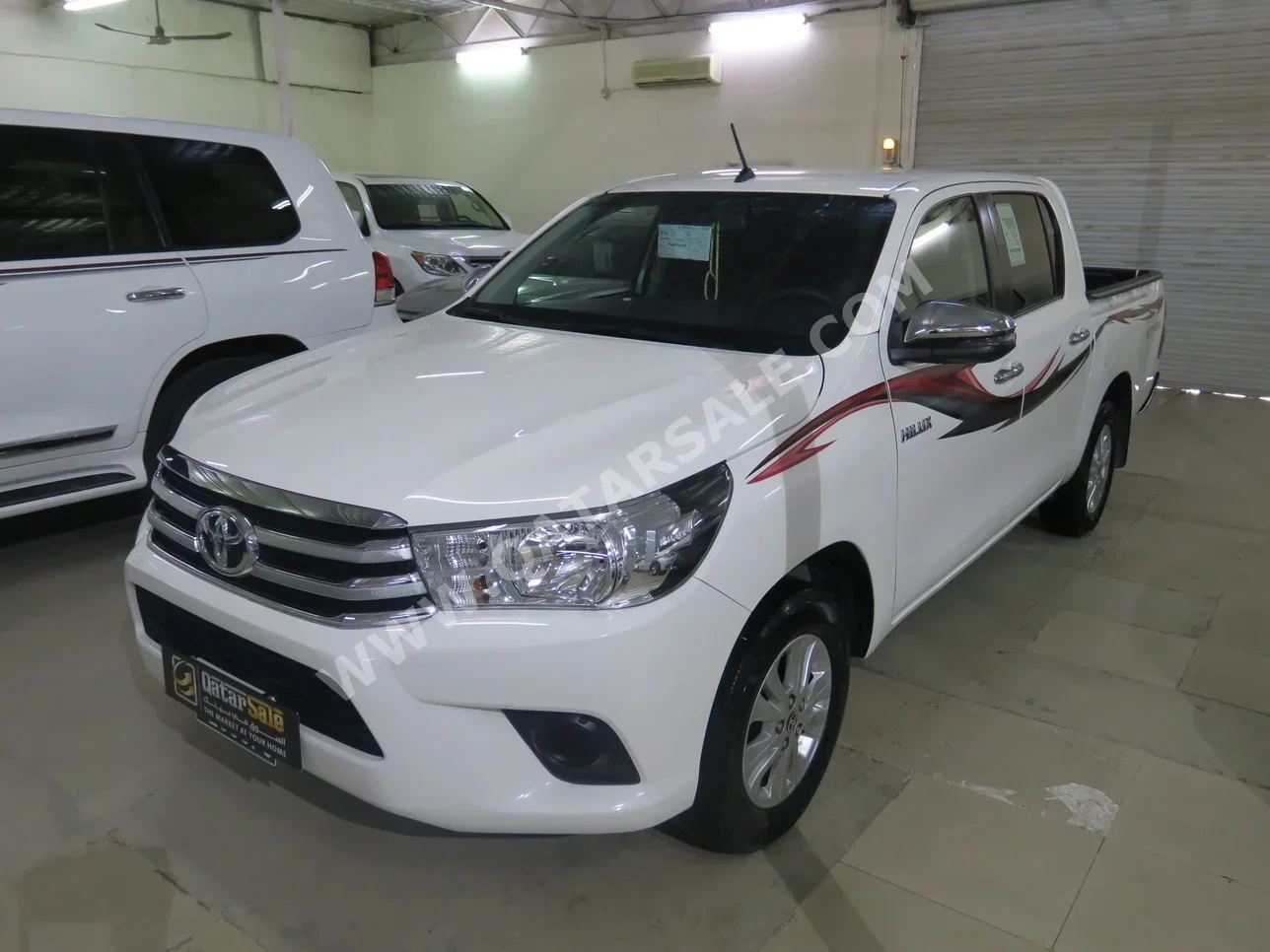Toyota  Hilux  2023  Automatic  19,000 Km  4 Cylinder  Four Wheel Drive (4WD)  Pick Up  White  With Warranty