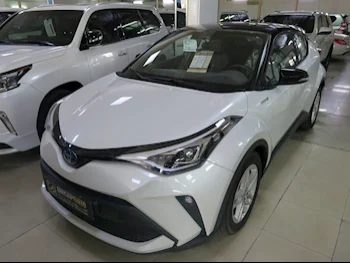 Toyota  C-HR  HIBRID  2023  Automatic  5,000 Km  4 Cylinder  Front Wheel Drive (FWD)  Hatchback  White  With Warranty