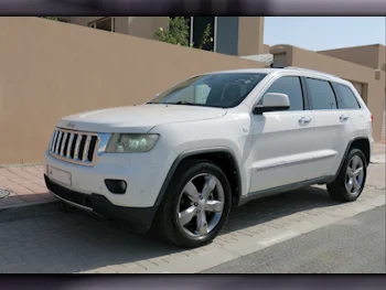 Jeep  Grand Cherokee  Limited  2012  Automatic  170,000 Km  6 Cylinder  Four Wheel Drive (4WD)  SUV  White
