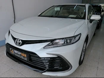 Toyota  Camry  LE  2022  Automatic  11,000 Km  4 Cylinder  Front Wheel Drive (FWD)  Sedan  White