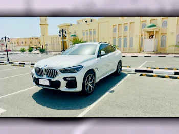 BMW  X-Series  X6  2021  Automatic  85,000 Km  6 Cylinder  Four Wheel Drive (4WD)  SUV  White  With Warranty