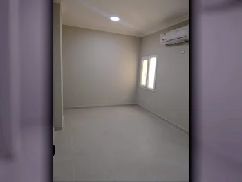 3 Bedrooms  Apartment  For Rent  in Doha -  Al Mansoura  Not Furnished