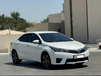 Toyota  Corolla  2015  Automatic  127,000 Km  4 Cylinder  Front Wheel Drive (FWD)  Sedan  White