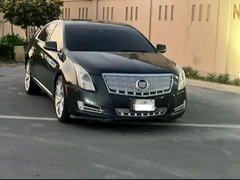Cadillac  XTS  4  2013  Automatic  140,000 Km  6 Cylinder  Rear Wheel Drive (RWD)  Sedan  Black