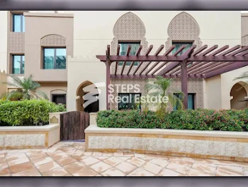 4 Bedrooms  Apartment  For Rent  in Doha -  The Pearl  Semi Furnished