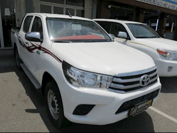 Toyota  Hilux  2022  Automatic  46,000 Km  4 Cylinder  Four Wheel Drive (4WD)  Pick Up  White  With Warranty