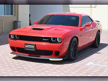 Dodge  Challenger  Hellcat  2016  Automatic  92,000 Km  8 Cylinder  Rear Wheel Drive (RWD)  Coupe / Sport  Red