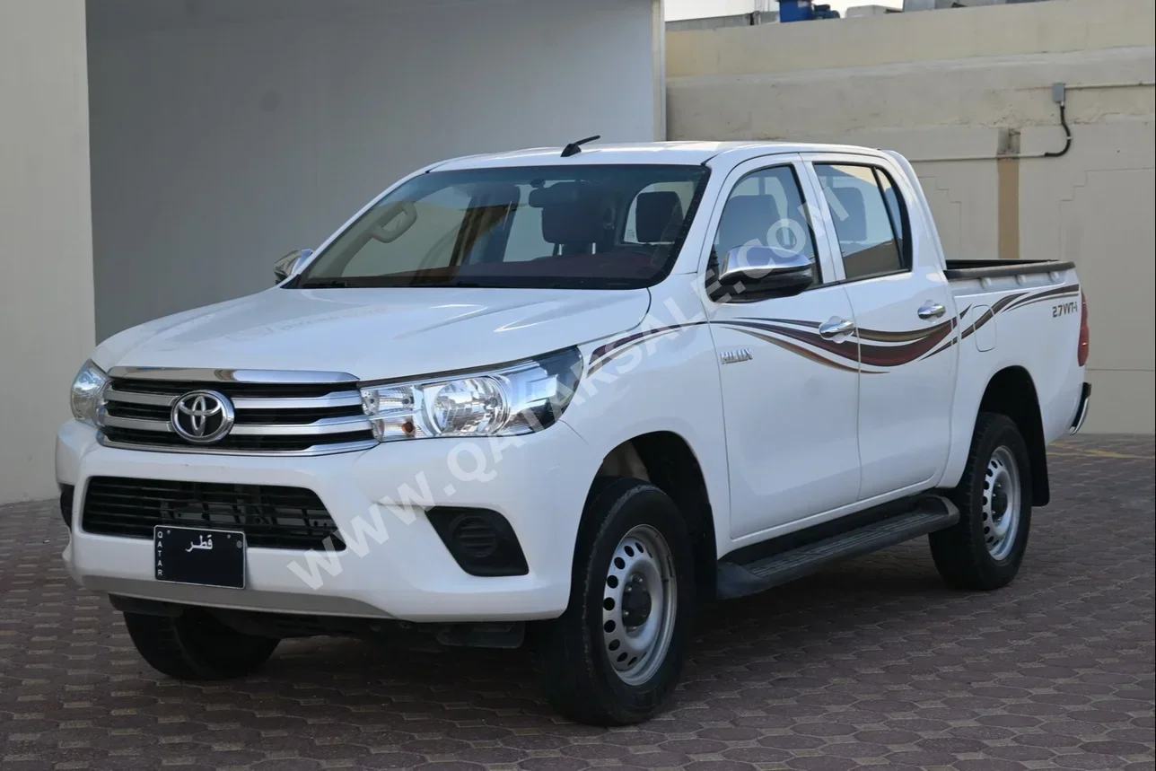Toyota  Hilux  2019  Automatic  125,000 Km  4 Cylinder  Four Wheel Drive (4WD)  Pick Up  White