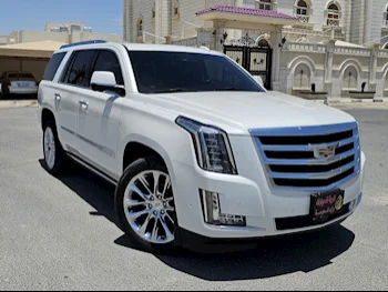 Cadillac  Escalade  Premium  2020  Automatic  75,000 Km  8 Cylinder  Four Wheel Drive (4WD)  SUV  White  With Warranty