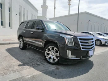 Cadillac  Escalade  2015  Automatic  192,000 Km  8 Cylinder  Four Wheel Drive (4WD)  SUV  Brown
