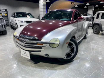 Chevrolet  SSR  2005  Automatic  157,000 Km  6 Cylinder  All Wheel Drive (AWD)  Pick Up  Red and Silver