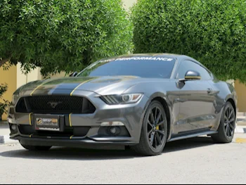 Ford  Mustang  GT  2015  Automatic  140,000 Km  8 Cylinder  Rear Wheel Drive (RWD)  Coupe / Sport  Gray