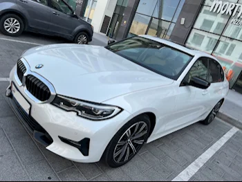 BMW  3-Series  330i  2019  Automatic  50,850 Km  4 Cylinder  Rear Wheel Drive (RWD)  Sedan  White  With Warranty