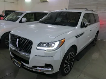 Lincoln  Navigator  Presidential  2022  Automatic  16,000 Km  8 Cylinder  Four Wheel Drive (4WD)  SUV  White  With Warranty