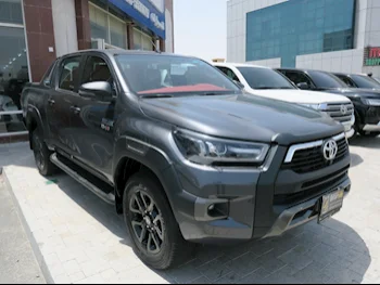 Toyota  Hilux  2023  Automatic  12,000 Km  4 Cylinder  Four Wheel Drive (4WD)  Pick Up  Gray  With Warranty