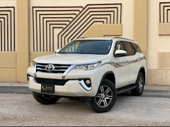 Toyota  Fortuner  2019  Automatic  261,000 Km  6 Cylinder  Four Wheel Drive (4WD)  SUV  White