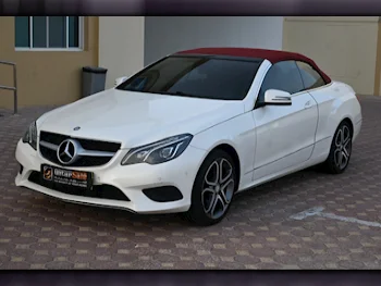 Mercedes-Benz  E-Class  200  2015  Automatic  203,000 Km  4 Cylinder  Rear Wheel Drive (RWD)  Convertible  Pearl