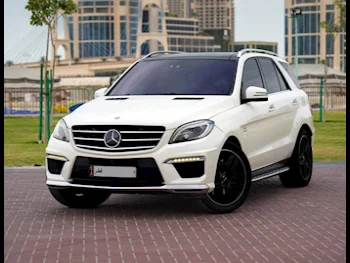 Mercedes-Benz  ML  63 AMG  2015  Automatic  119,000 Km  8 Cylinder  Four Wheel Drive (4WD)  SUV  White